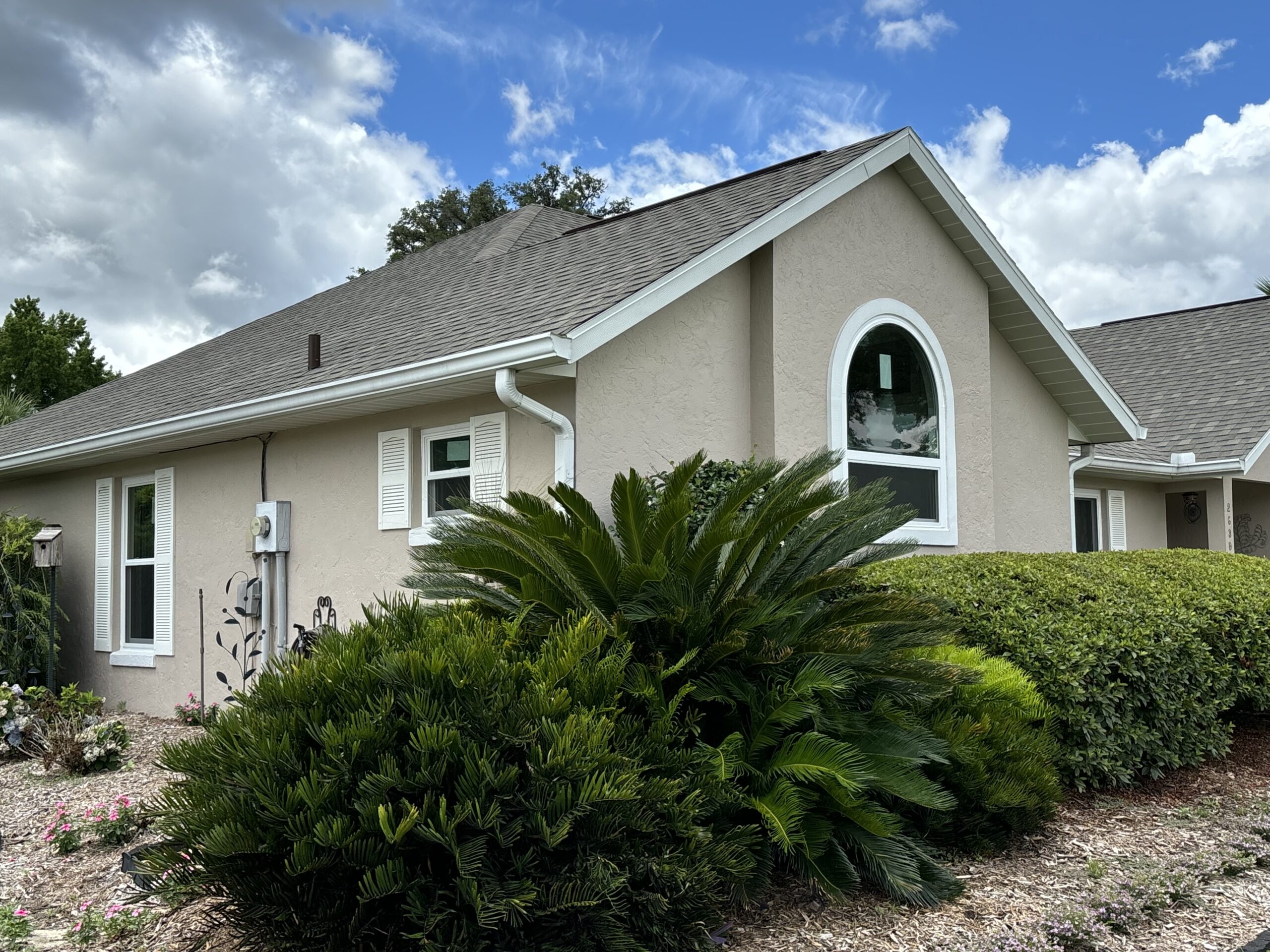 Arched gable window replacement on a Central Florida stucco home